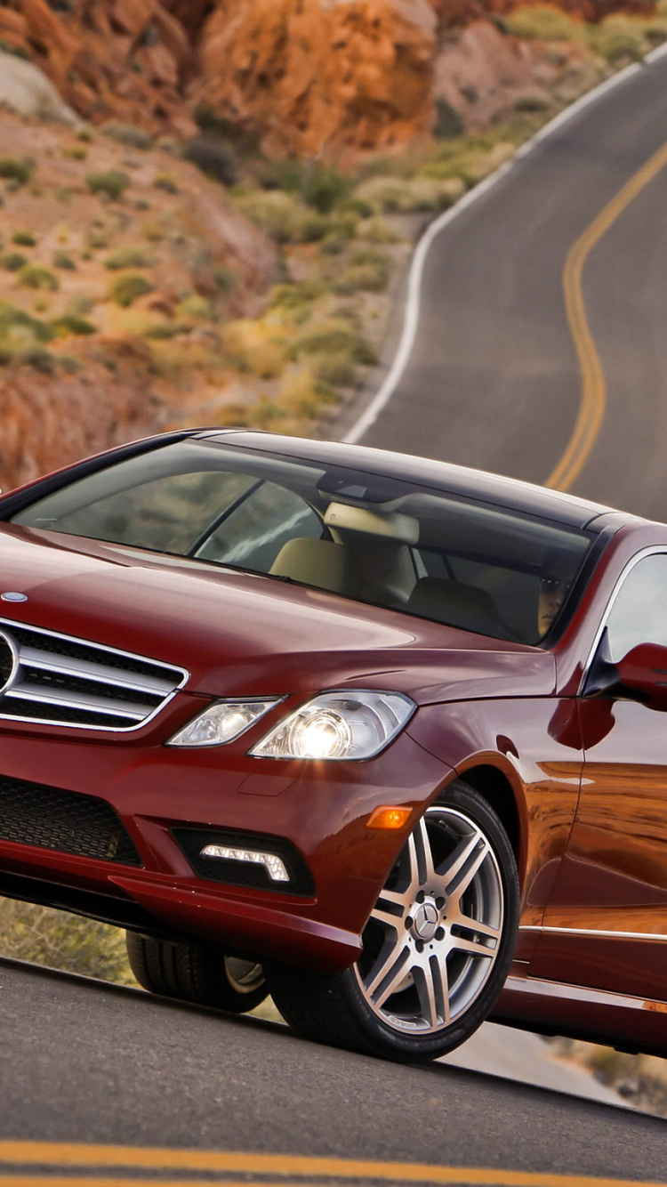 Red Mercedes Benz Coupe on Road During Daytime. Wallpaper in 750x1334 Resolution