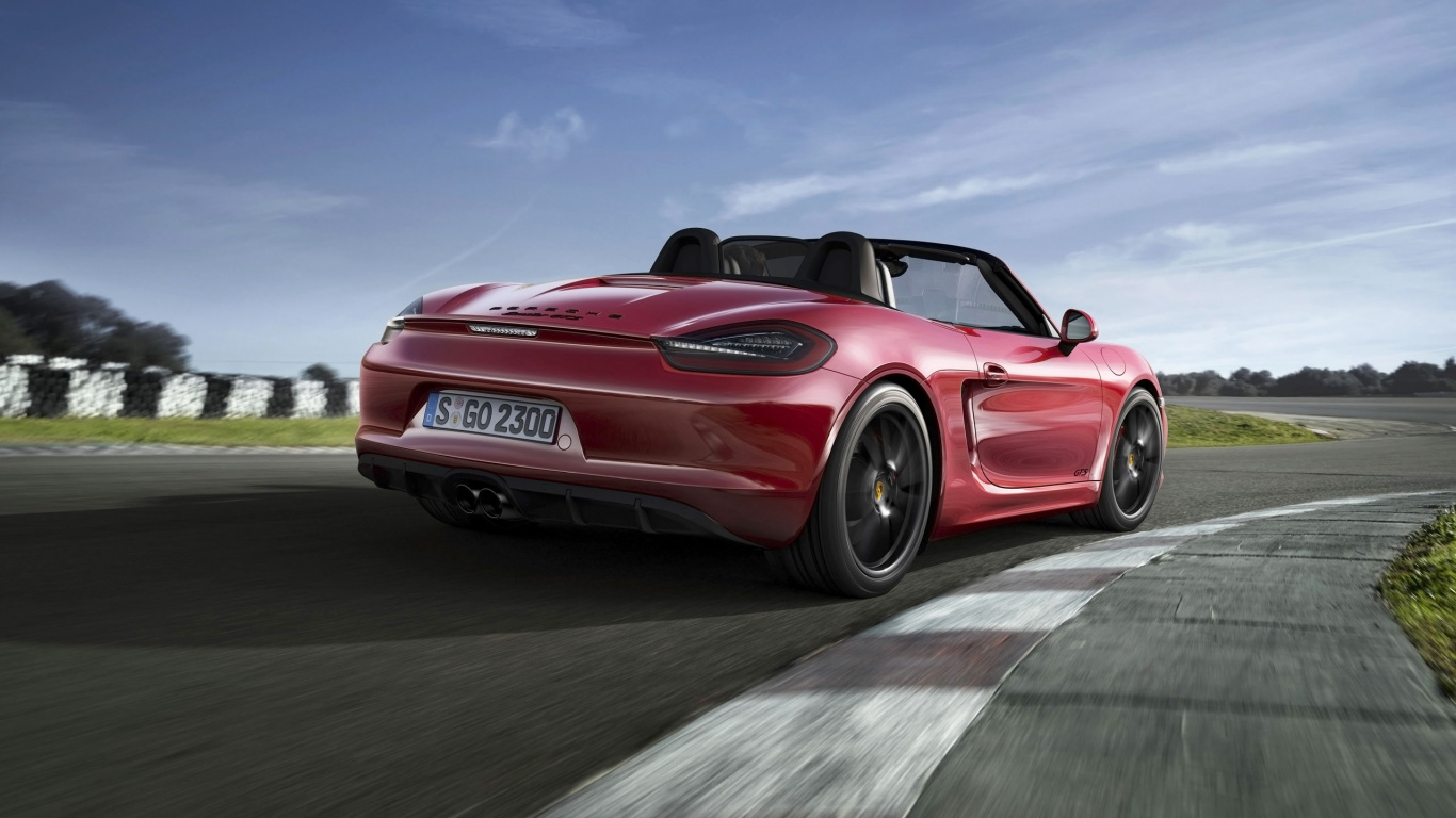 Chevrolet Camaro Rojo en la Carretera Durante el Día. Wallpaper in 1366x768 Resolution