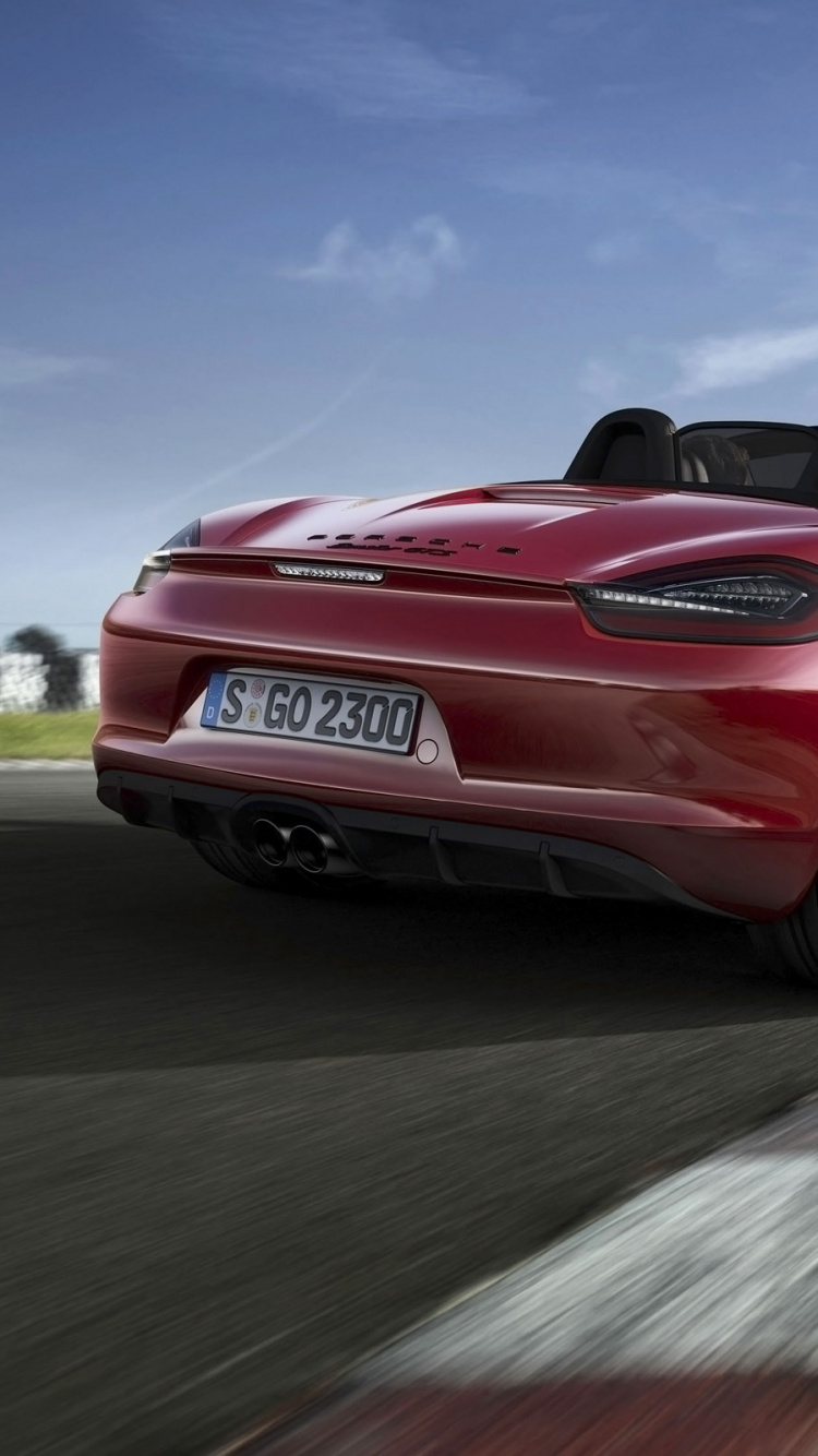 Red Chevrolet Camaro on Road During Daytime. Wallpaper in 750x1334 Resolution