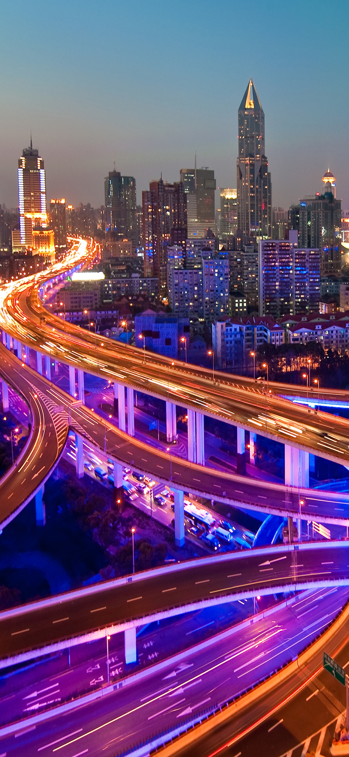 Time Lapse Photography of City Lights During Night Time. Wallpaper in 1125x2436 Resolution