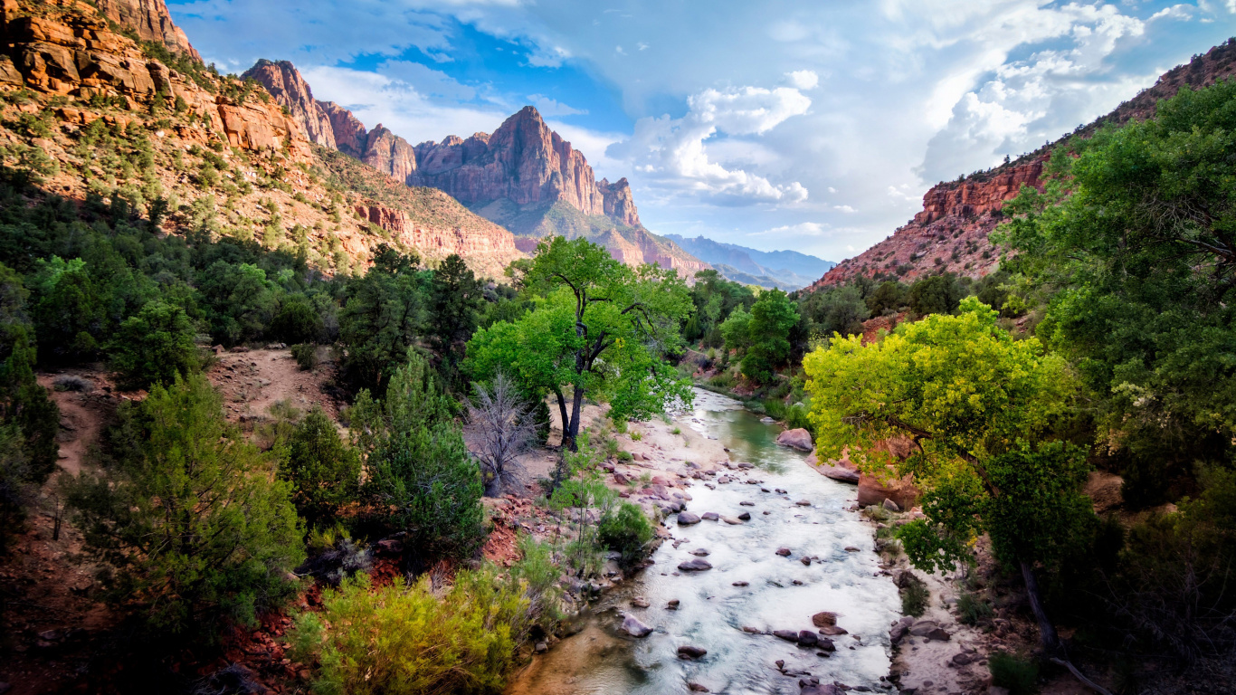 Green Trees Near Brown Mountain Under Blue Sky During Daytime. Wallpaper in 1366x768 Resolution