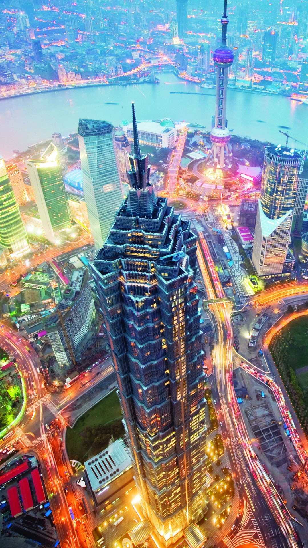 Aerial View of City Buildings During Night Time. Wallpaper in 1080x1920 Resolution