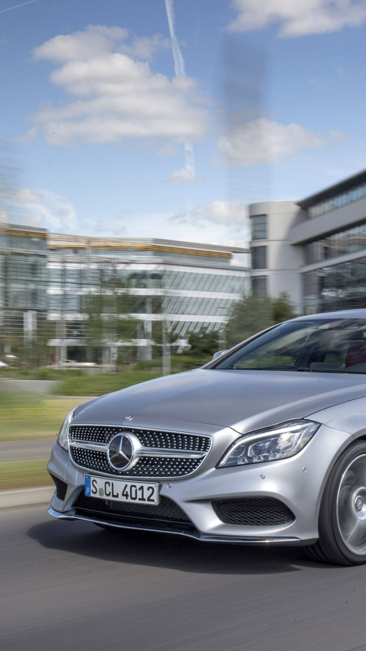 Silver Mercedes Benz Coupe on Road During Daytime. Wallpaper in 750x1334 Resolution