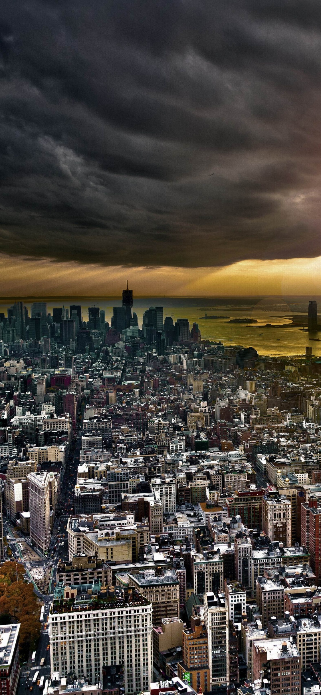 Aerial View of City During Sunset. Wallpaper in 1125x2436 Resolution