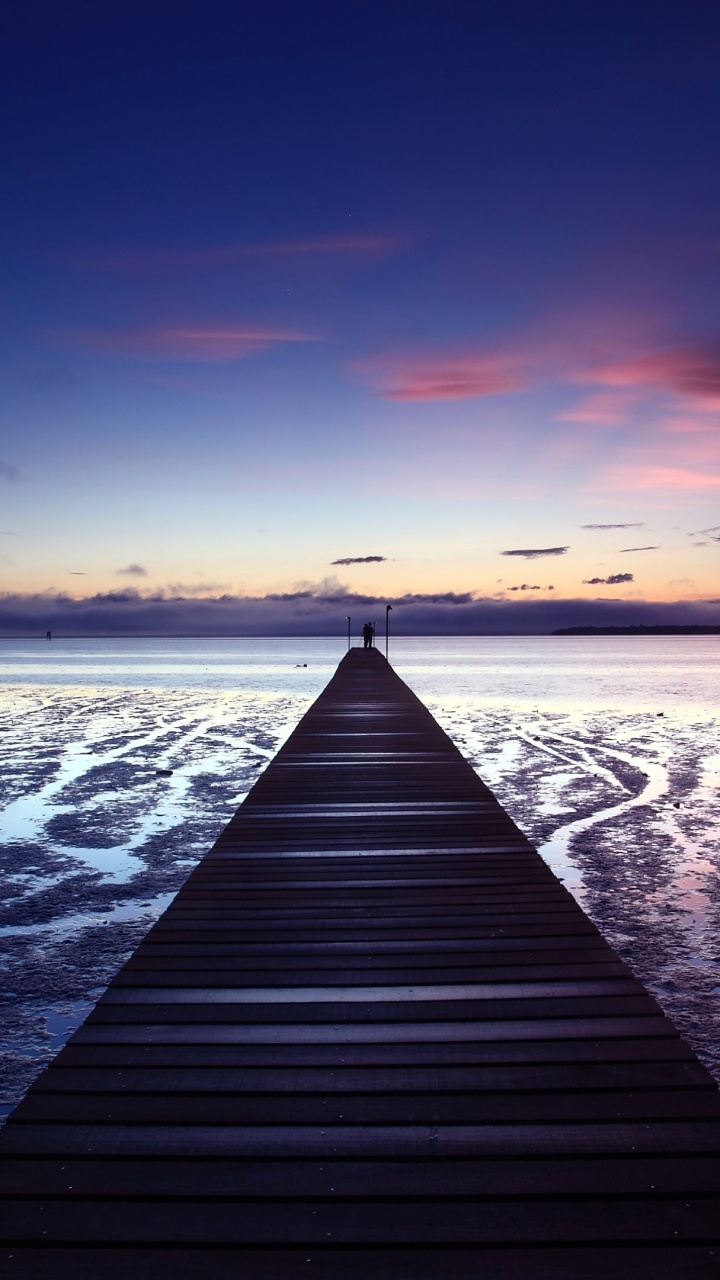 Muelle de Madera Marrón en el Mar Durante la Puesta de Sol. Wallpaper in 720x1280 Resolution