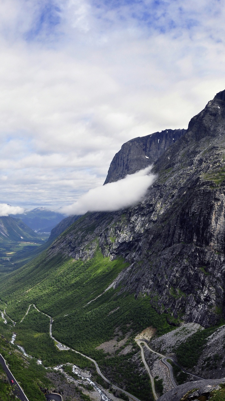 Green Mountains Under White Clouds During Daytime. Wallpaper in 720x1280 Resolution