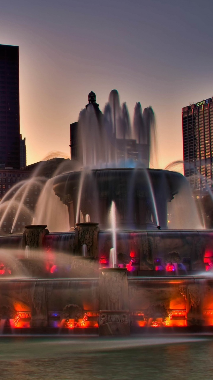 Water Fountain in The City During Night Time. Wallpaper in 720x1280 Resolution