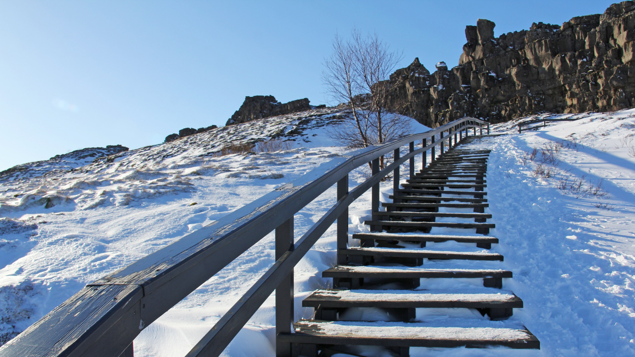 Brown Wooden Staircase Covered With Snow. Wallpaper in 1280x720 Resolution