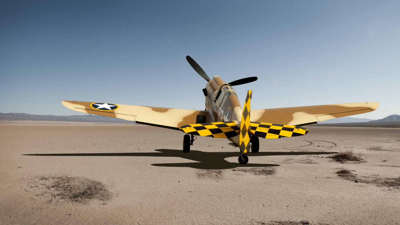 Yellow and White Plane on Gray Sand During Daytime. Wallpaper in 1366x768 Resolution