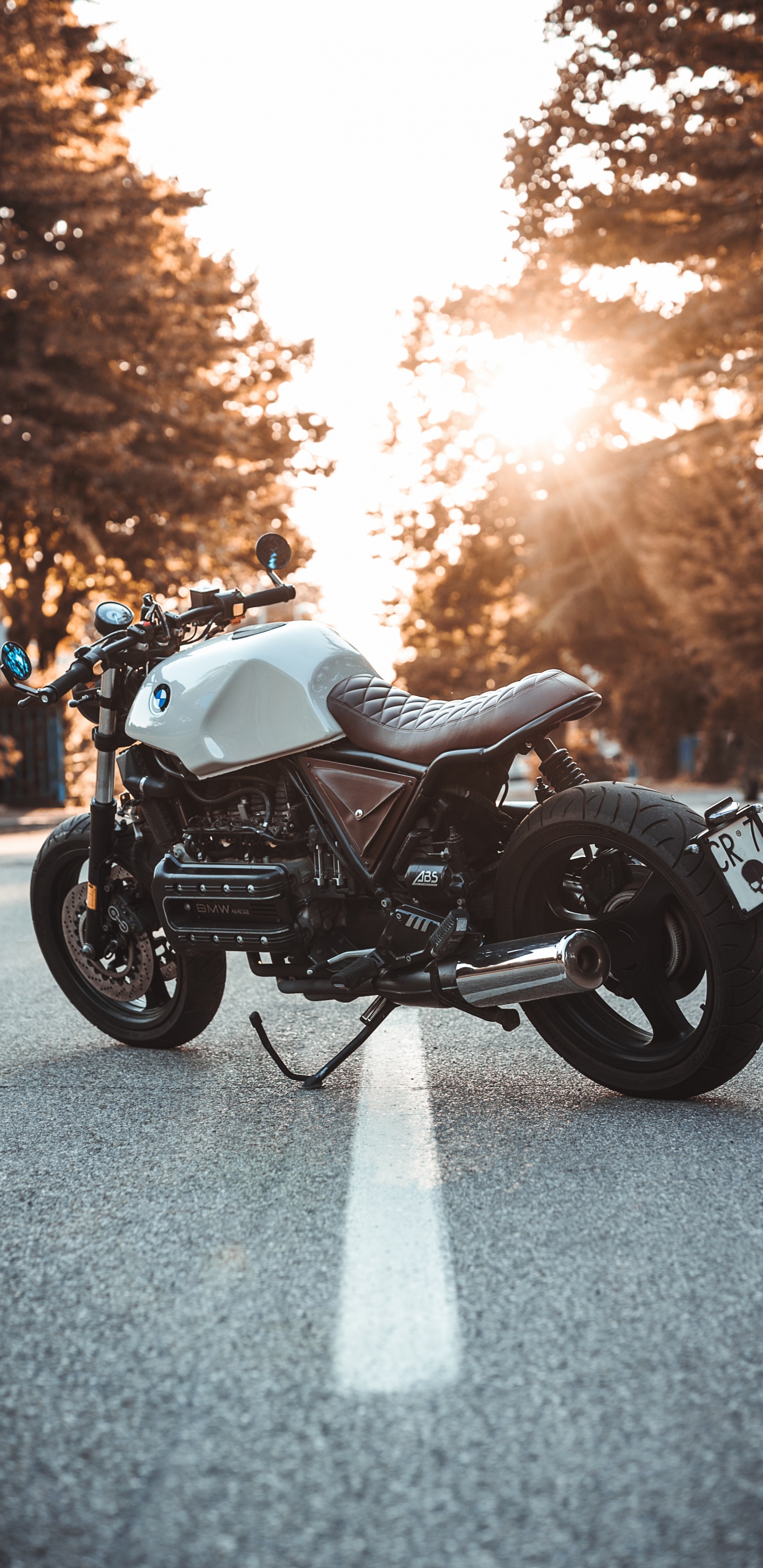 Black and Silver Cruiser Motorcycle on Gray Asphalt Road During Daytime. Wallpaper in 1440x2960 Resolution