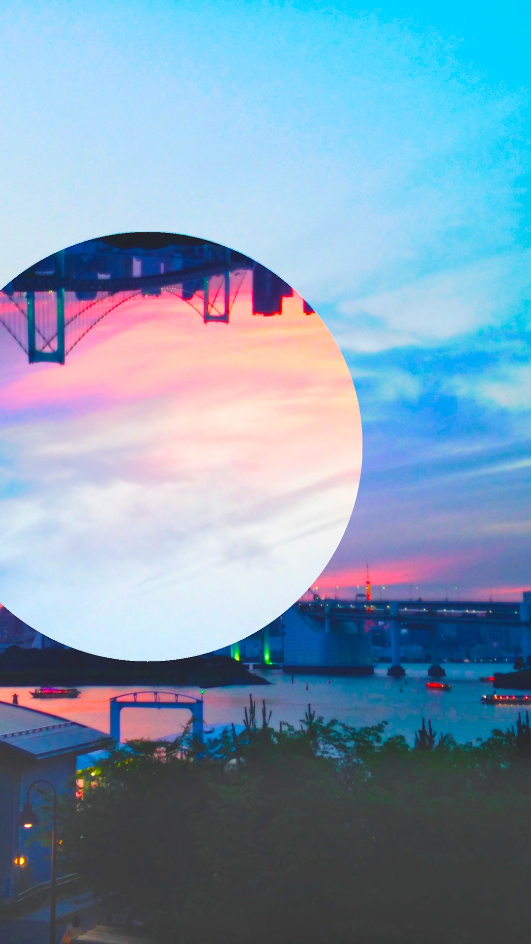 Round Mirror Reflecting City Buildings During Night Time. Wallpaper in 1080x1920 Resolution