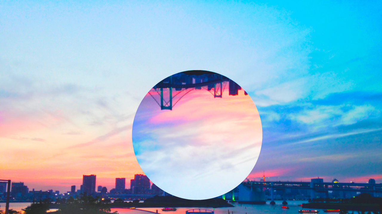 Round Mirror Reflecting City Buildings During Night Time. Wallpaper in 1280x720 Resolution