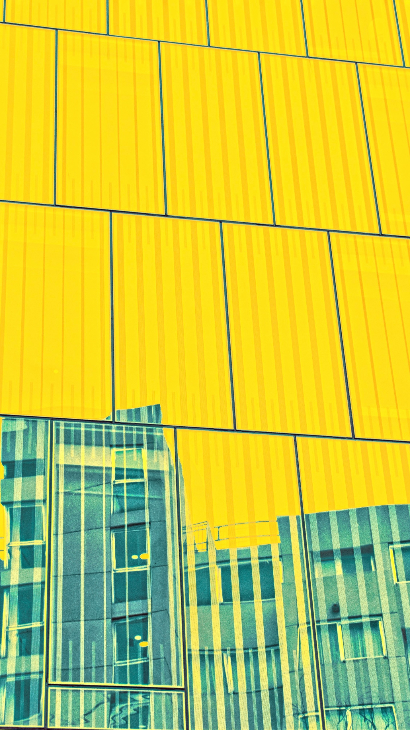 Immeuble de Grande Hauteur Jaune et Gris. Wallpaper in 1440x2560 Resolution