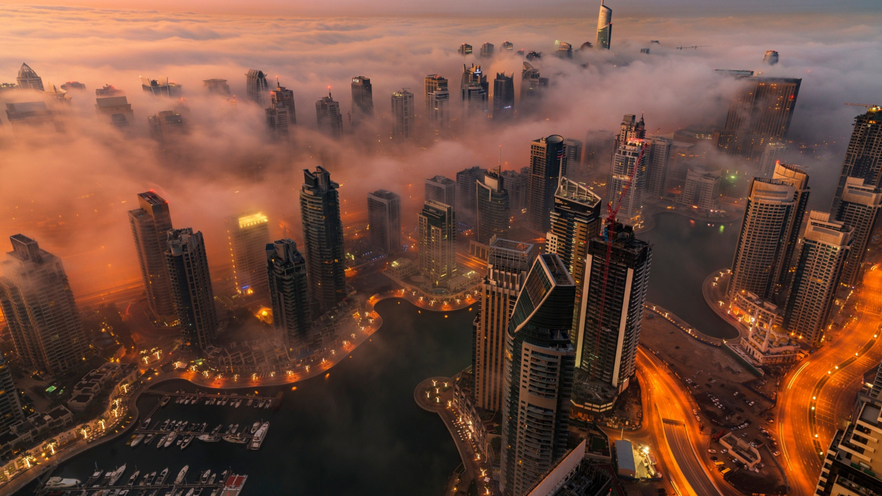 Vista Aérea de Los Edificios de la Ciudad Durante la Noche.. Wallpaper in 1280x720 Resolution