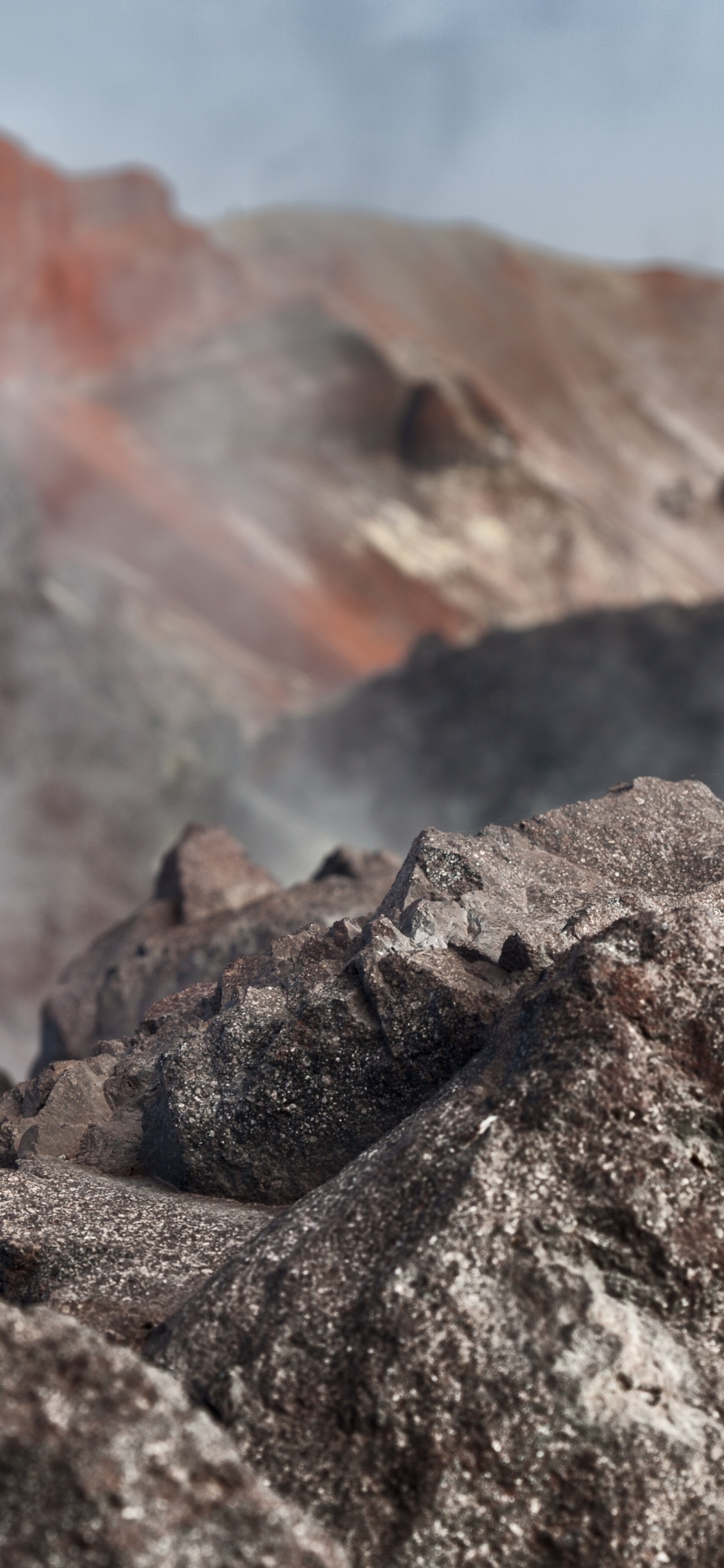 Gray Rock Formation During Daytime. Wallpaper in 1125x2436 Resolution
