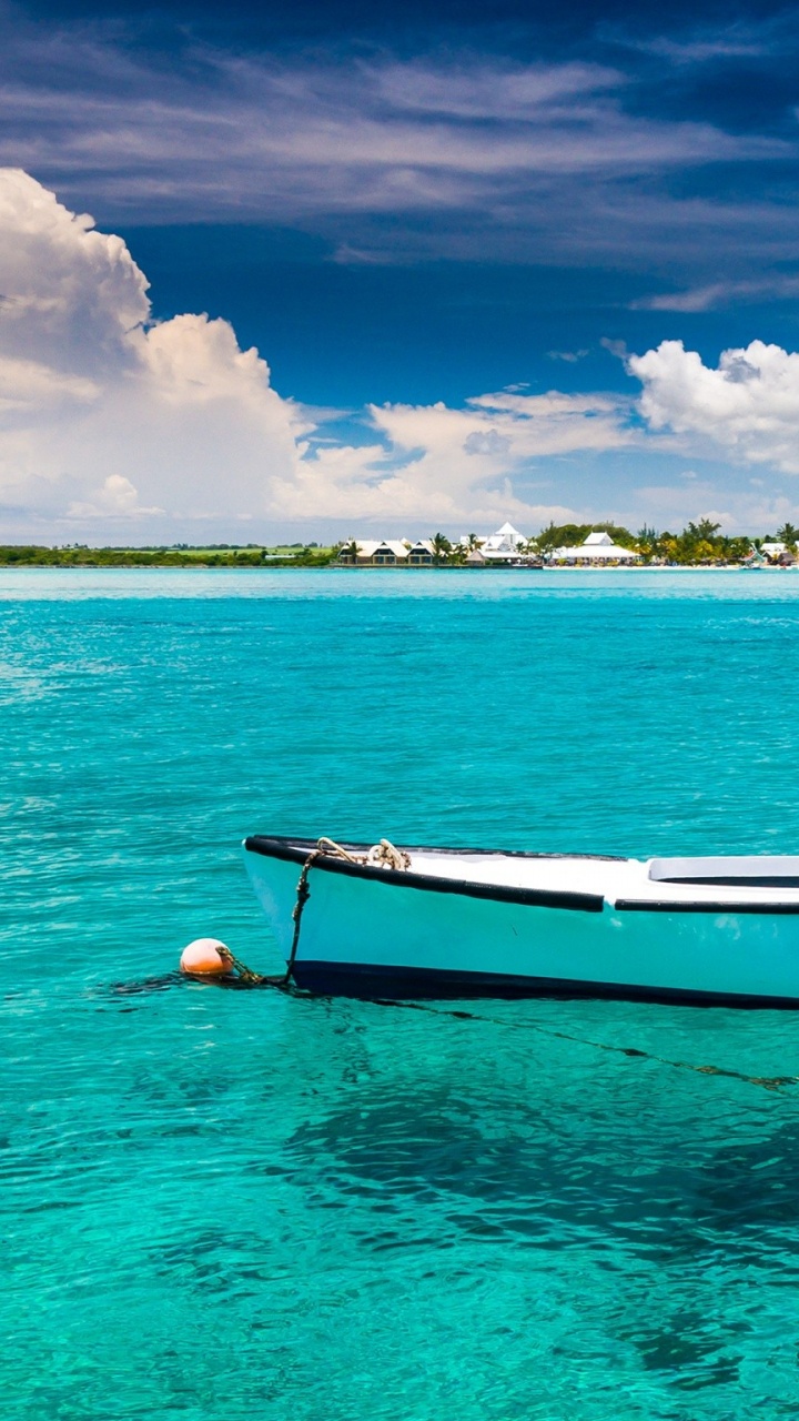 Bateau Blanc et Bleu Sur la Mer Pendant la Journée. Wallpaper in 720x1280 Resolution