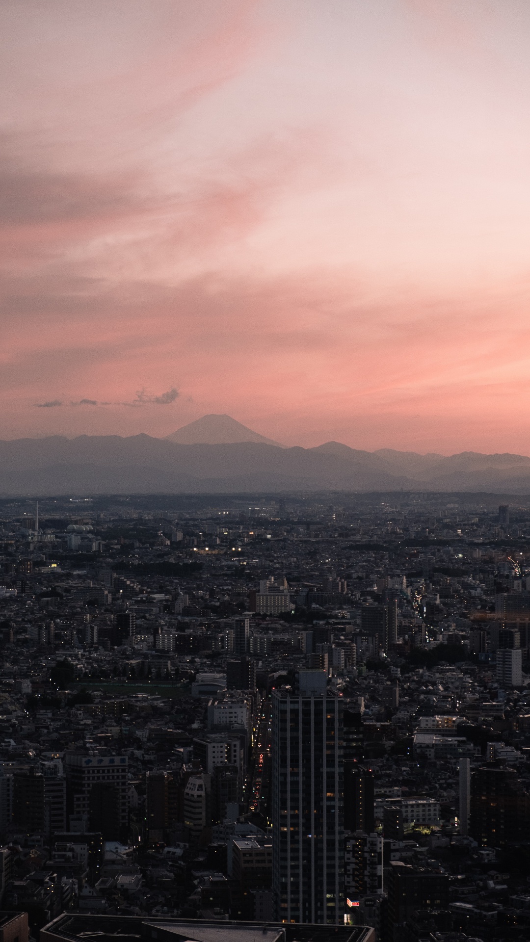 Aerial View of City Buildings During Sunset. Wallpaper in 1080x1920 Resolution