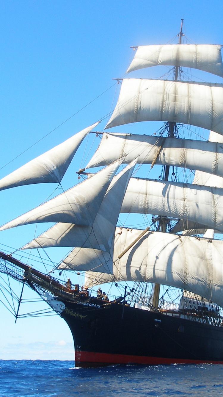 Black and White Sail Ship on Sea During Daytime. Wallpaper in 750x1334 Resolution