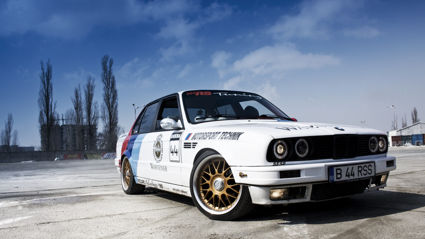 White and Blue Bmw m 3 Coupe on Gray Asphalt Road Under Blue and White Sunny. Wallpaper in 1366x768 Resolution