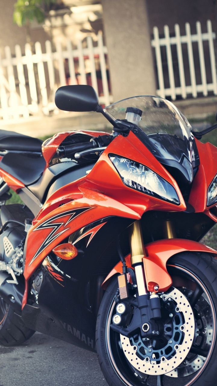 Orange and Black Sports Bike Parked on Road During Daytime. Wallpaper in 720x1280 Resolution