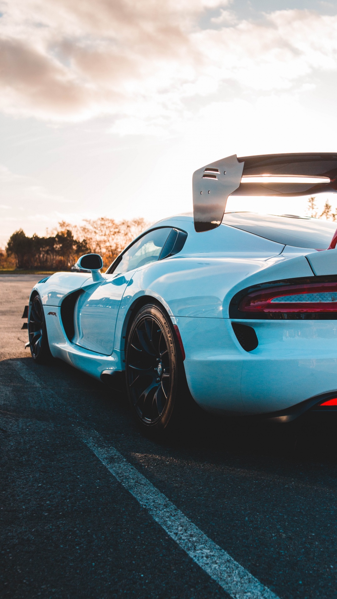 Blue and Black Sports Car on Road During Daytime. Wallpaper in 1080x1920 Resolution