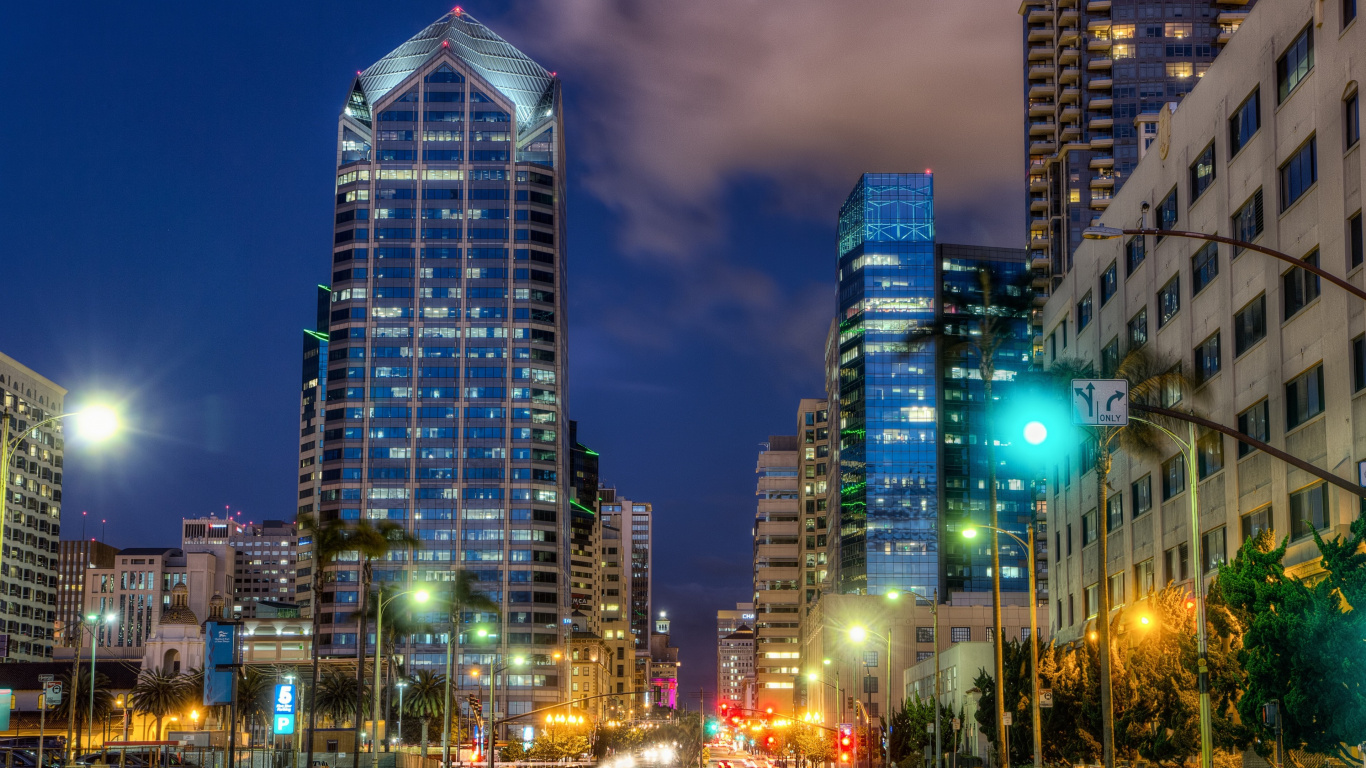 City Buildings With Lights Turned on During Night Time. Wallpaper in 1366x768 Resolution