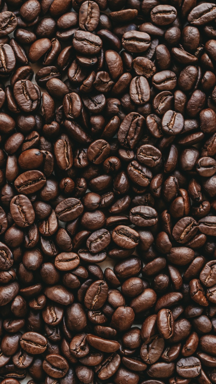 Coffee Beans on Brown Wooden Surface. Wallpaper in 720x1280 Resolution