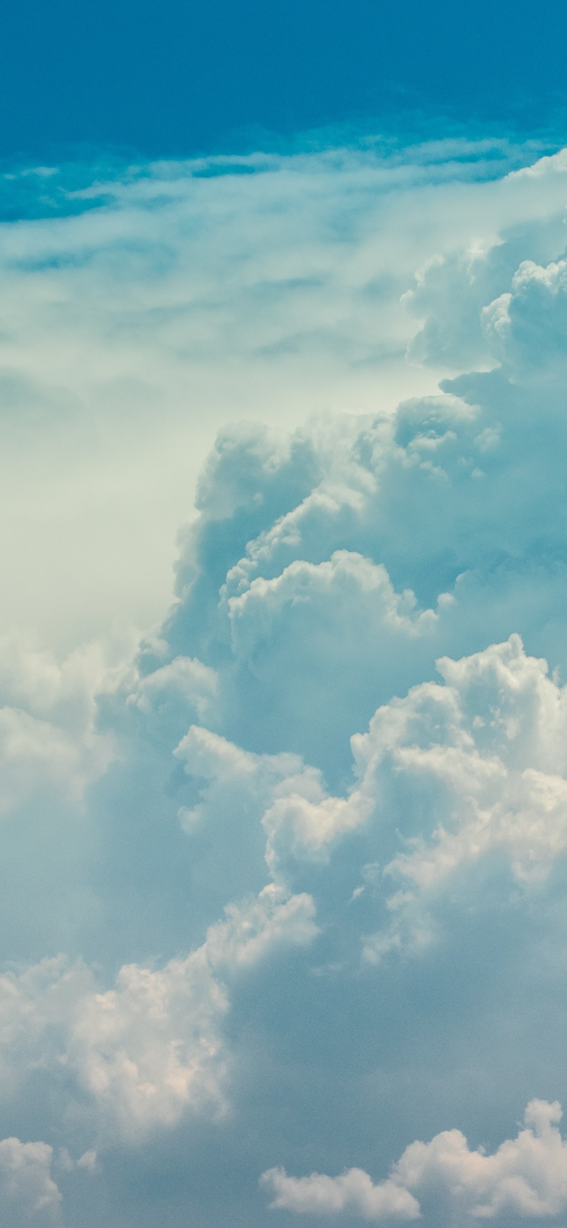 Nuages Blancs et Ciel Bleu. Wallpaper in 1125x2436 Resolution