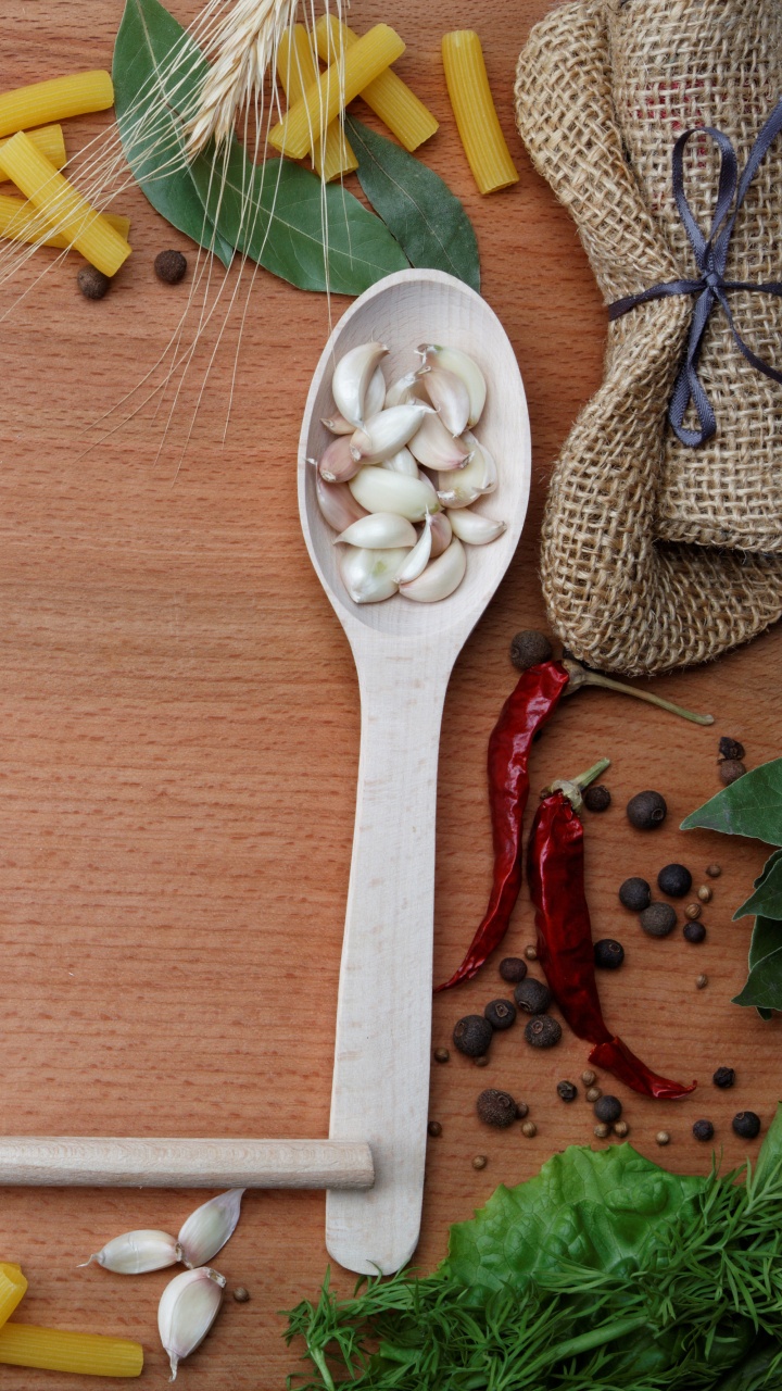 Brown Wooden Spoon With Assorted Spices. Wallpaper in 720x1280 Resolution