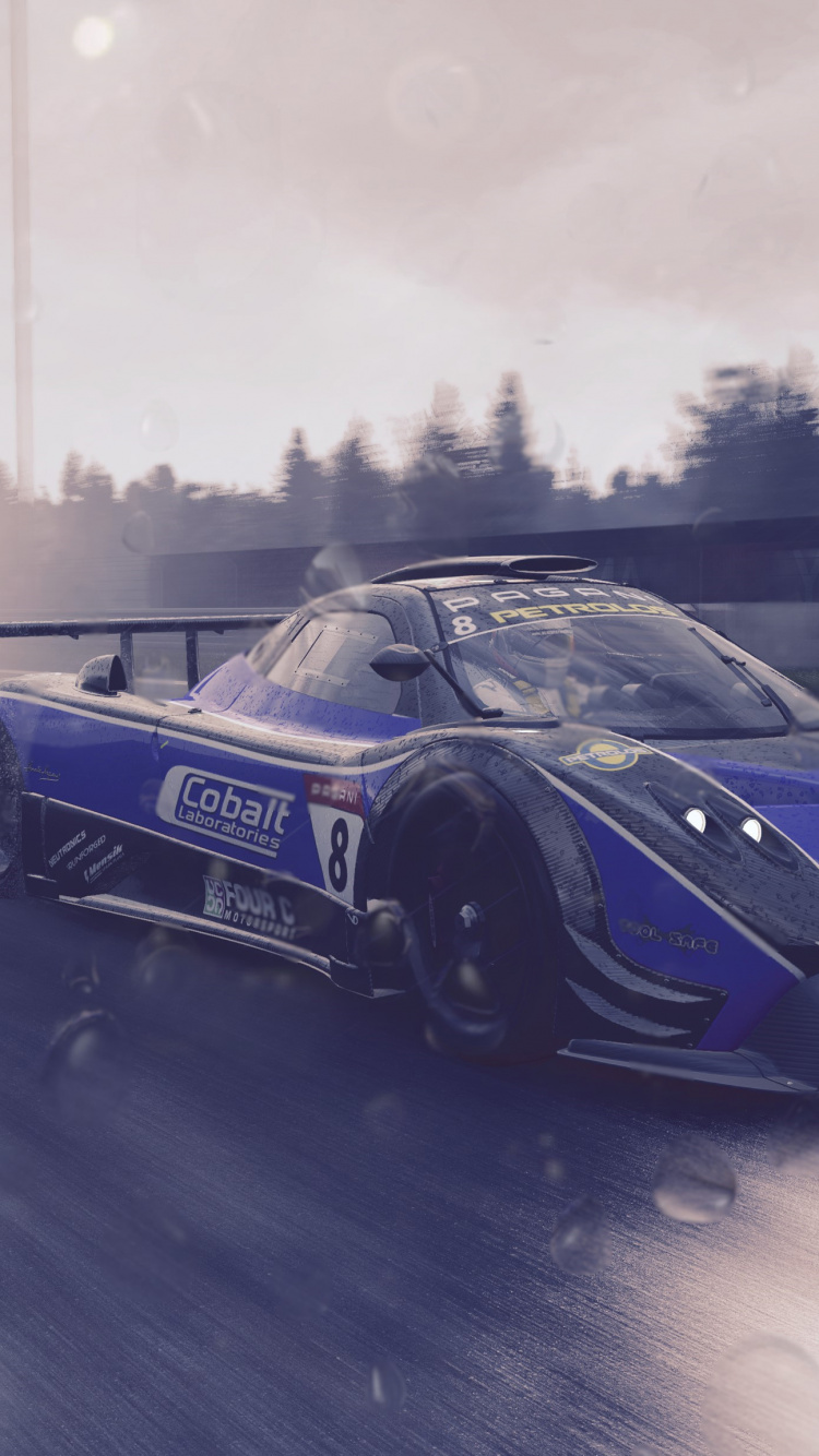 Blue Porsche 911 on Road. Wallpaper in 750x1334 Resolution