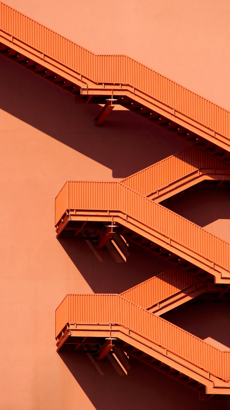 Braunes Betongebäude Tagsüber. Wallpaper in 750x1334 Resolution