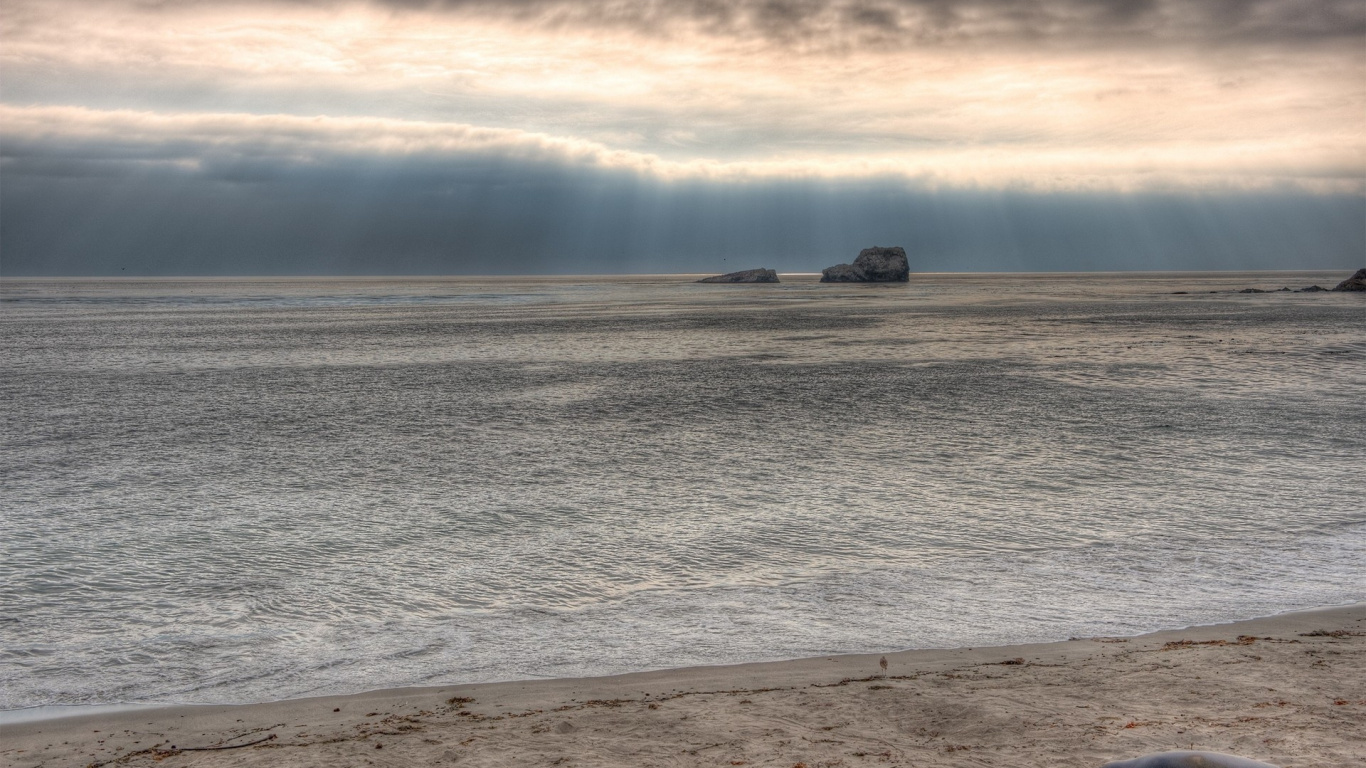 Brown Rock Formation on Sea During Daytime. Wallpaper in 1366x768 Resolution