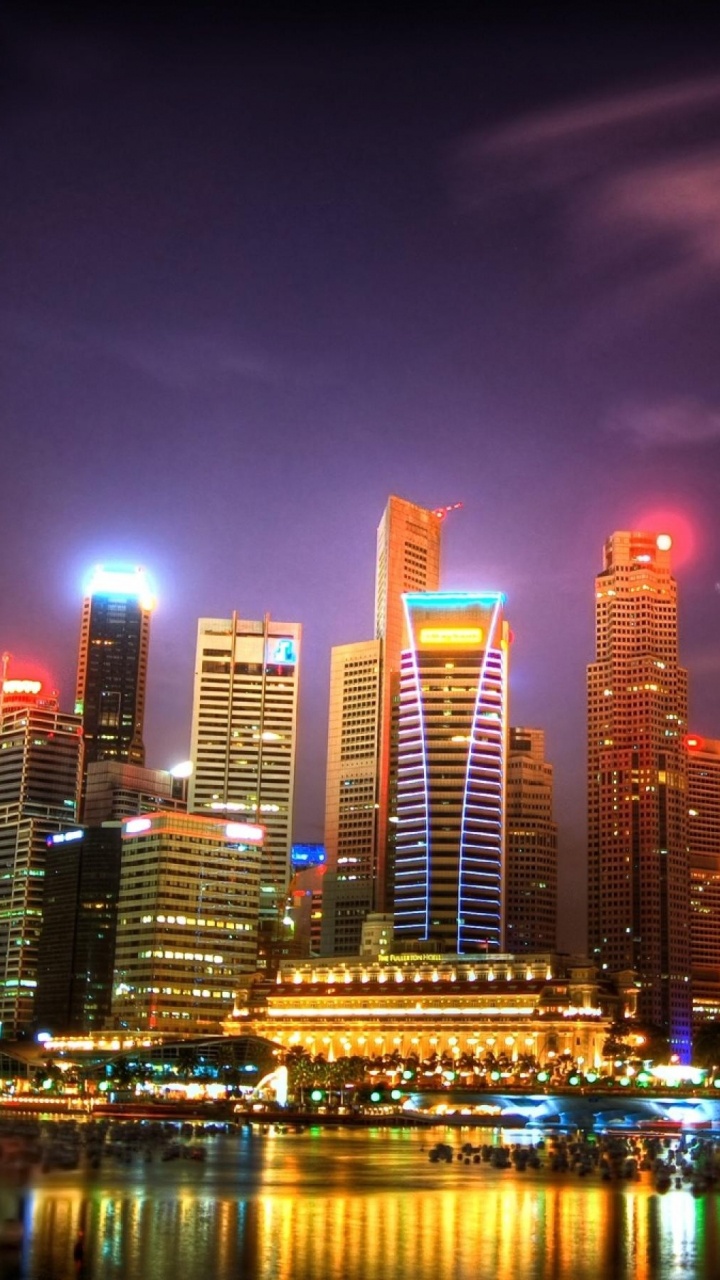 City Skyline During Night Time. Wallpaper in 720x1280 Resolution