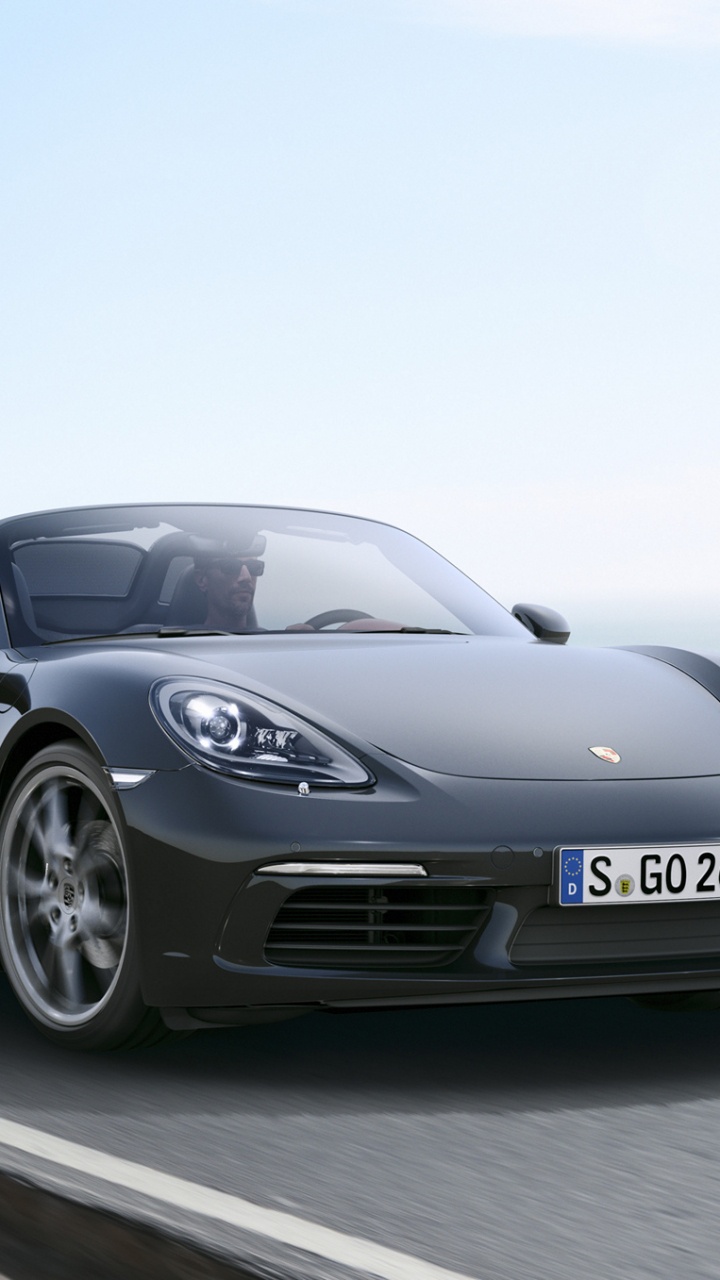 Schwarzer Porsche 911 Tagsüber Unterwegs. Wallpaper in 720x1280 Resolution