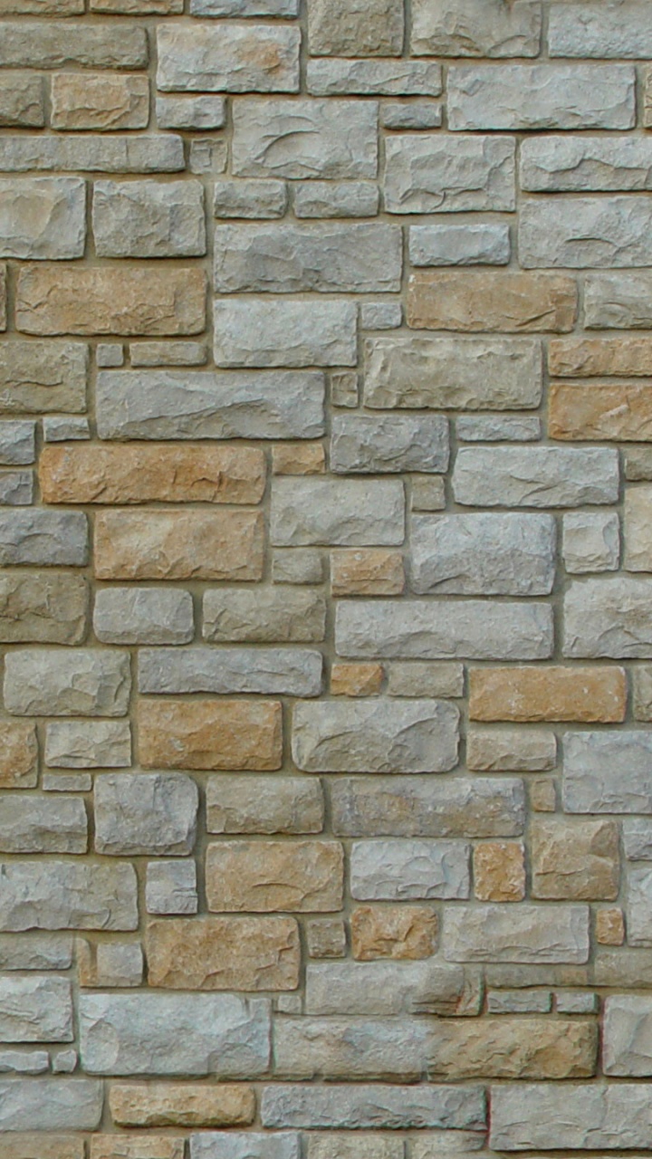 Braune Und Graue Backsteinmauer. Wallpaper in 720x1280 Resolution