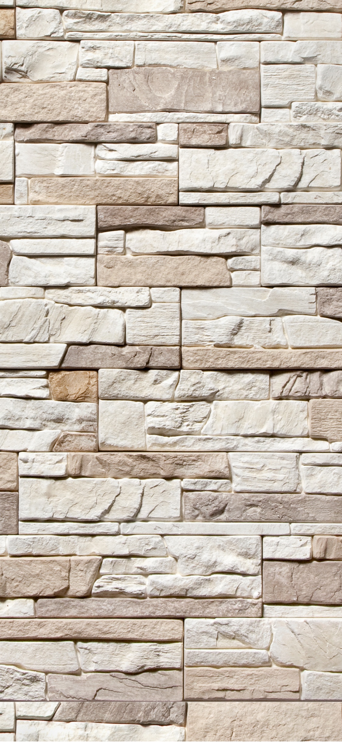 Brown and Beige Brick Wall. Wallpaper in 1125x2436 Resolution