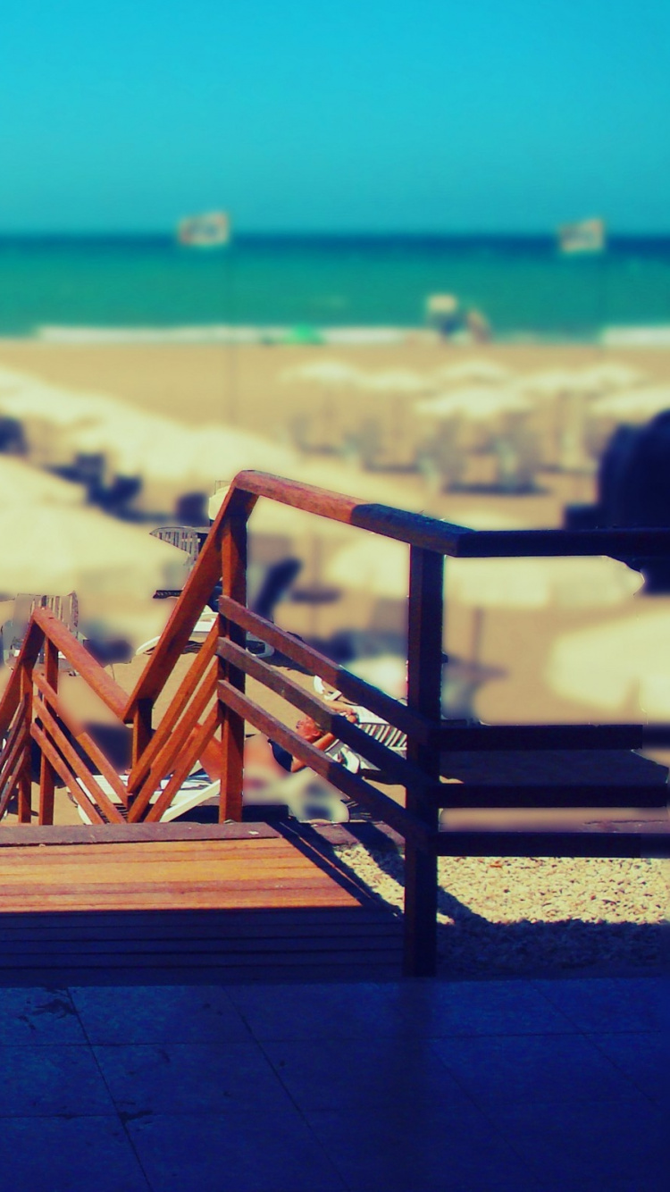 Brown Wooden Lounge Chair on Brown Wooden Dock During Daytime. Wallpaper in 750x1334 Resolution