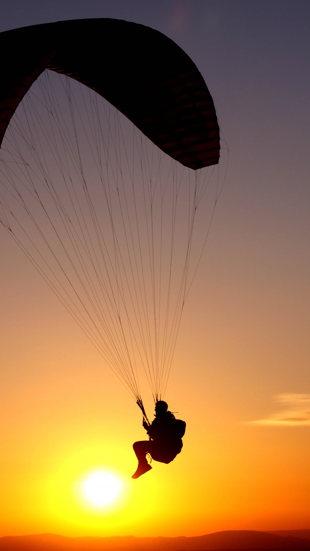 Silhouette of Person Riding Parachute During Sunset. Wallpaper in 1080x1920 Resolution