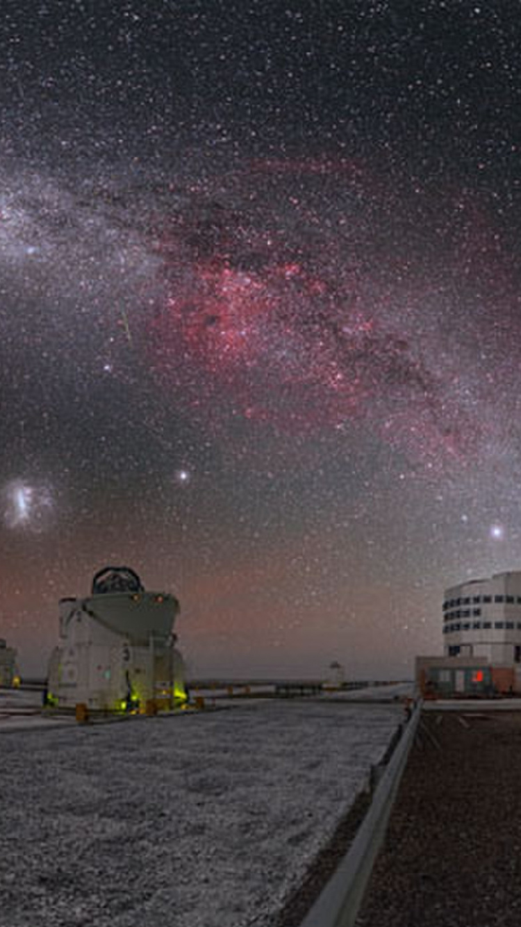 White and Gray Building Under Starry Night. Wallpaper in 750x1334 Resolution