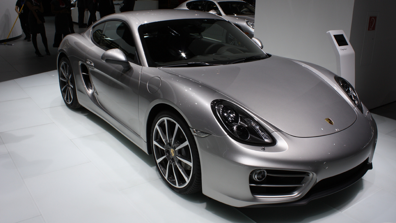 Silver Porsche 911 Parked in a Room. Wallpaper in 1366x768 Resolution