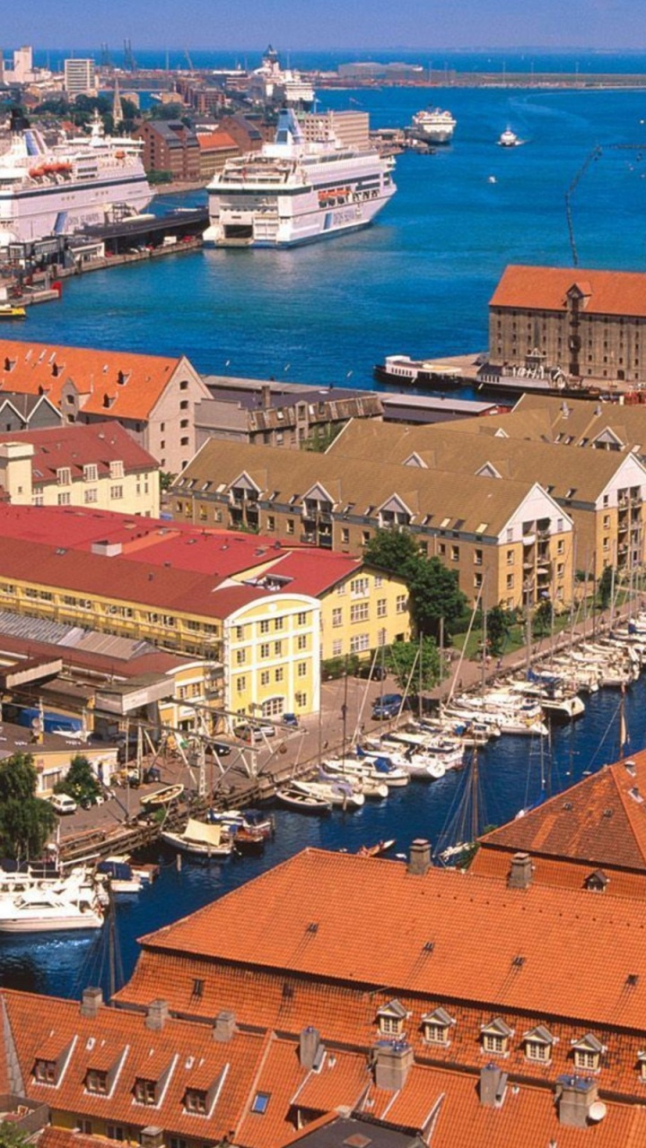Aerial View of City Buildings Near Body of Water During Daytime. Wallpaper in 720x1280 Resolution
