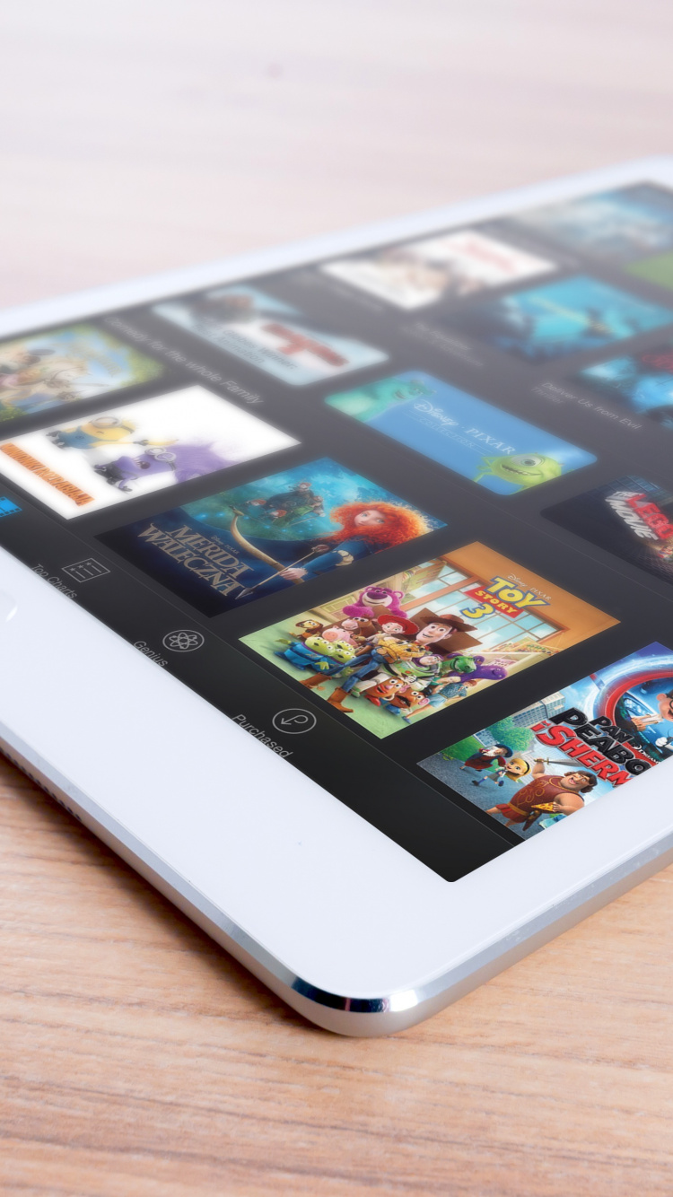 White Ipad on Brown Wooden Table. Wallpaper in 750x1334 Resolution