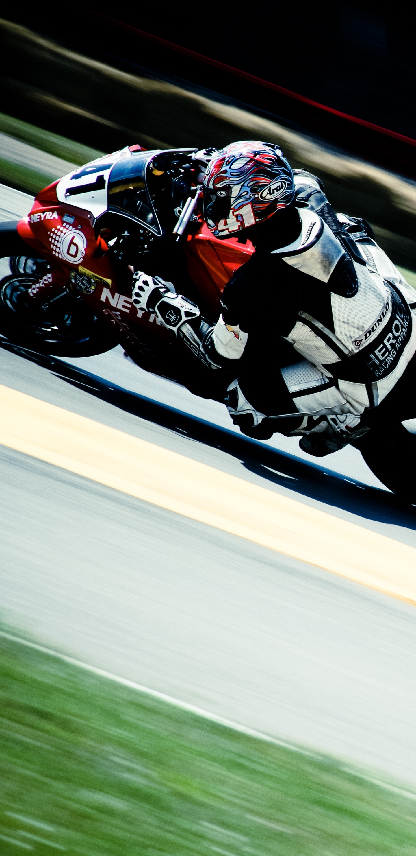 Man in Red and White Racing Suit Riding on Sports Bike. Wallpaper in 1440x2960 Resolution