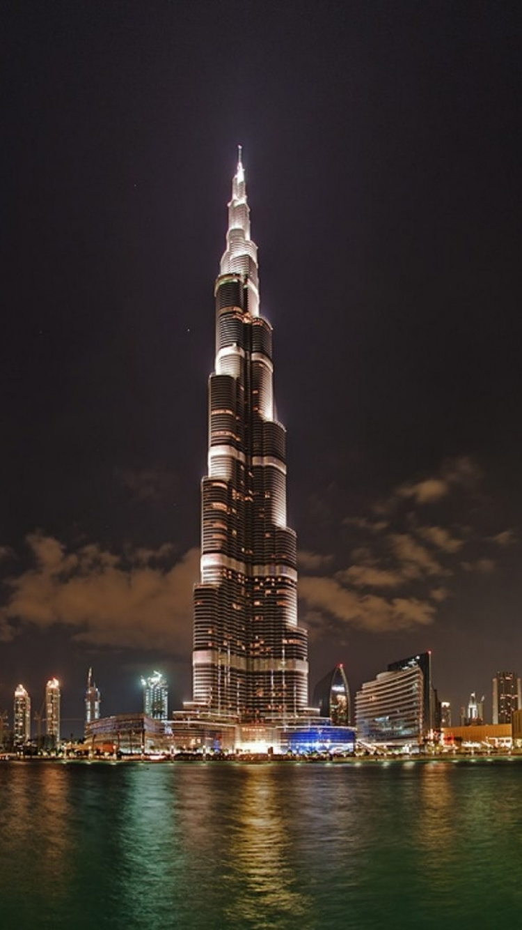 City Skyline During Night Time. Wallpaper in 750x1334 Resolution