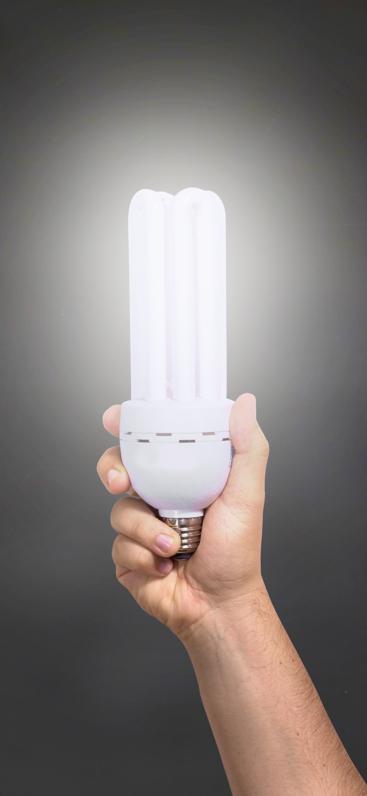 Person Holding White Plastic Container. Wallpaper in 1242x2688 Resolution