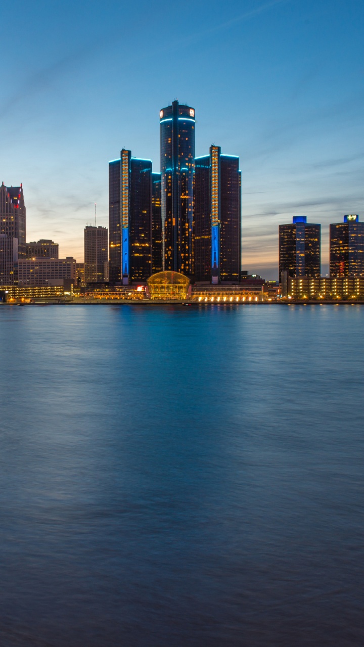 City Skyline Across Body of Water During Daytime. Wallpaper in 720x1280 Resolution