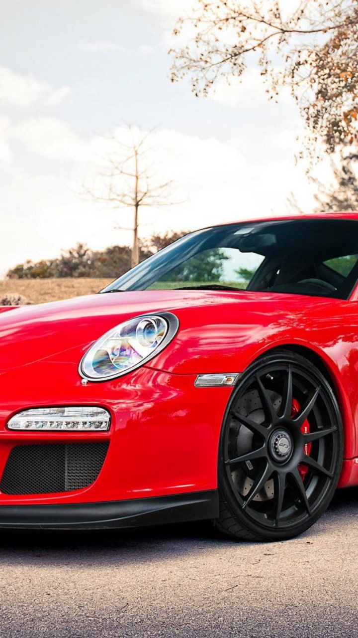 Roter Porsche 911 Tagsüber Auf Der Straße Geparkt. Wallpaper in 720x1280 Resolution