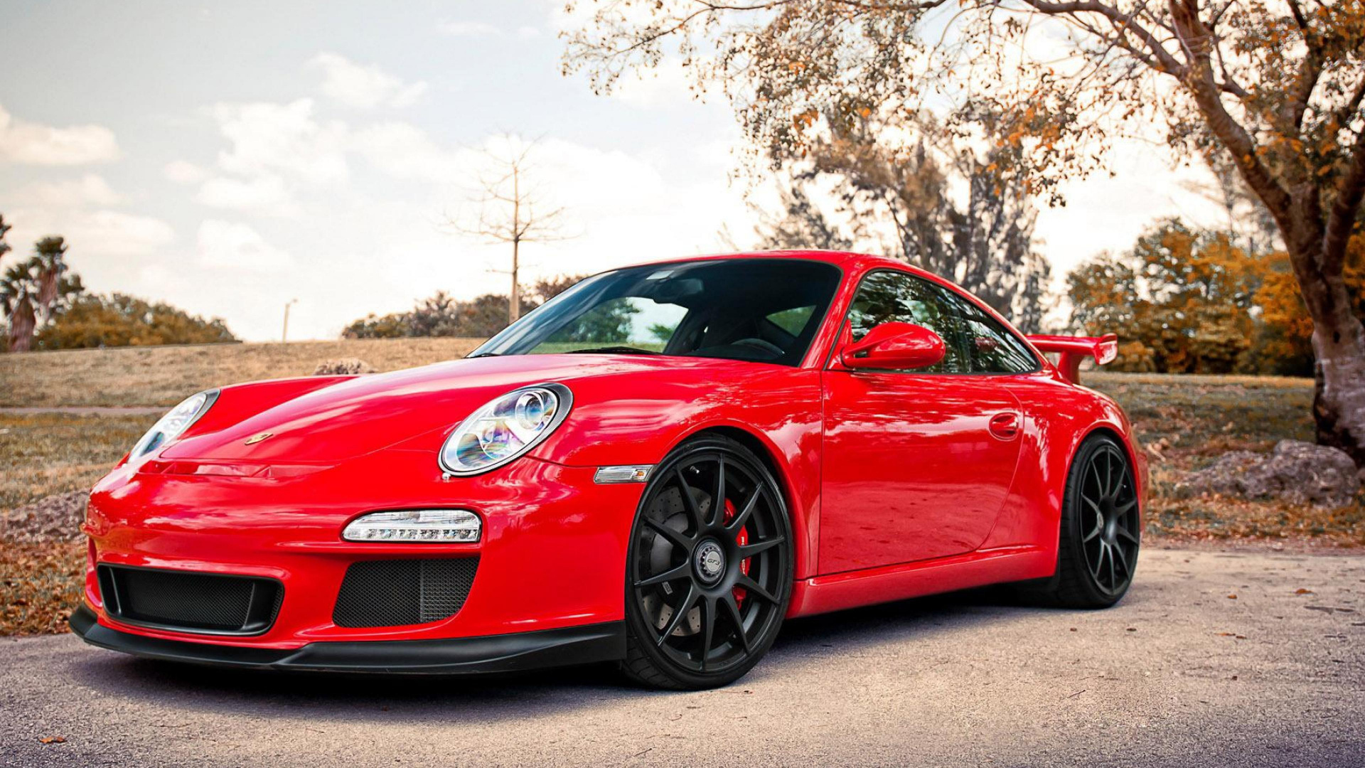 Porsche 911 Rouge Garée Sur Route Pendant la Journée. Wallpaper in 1920x1080 Resolution