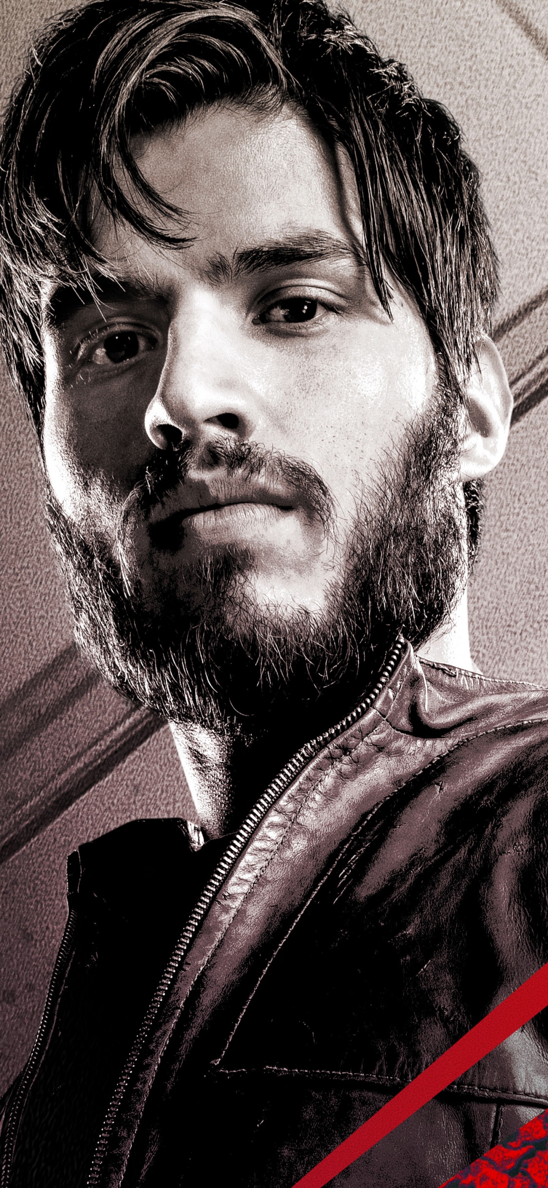 Mann in Schwarzer Lederjacke. Wallpaper in 1125x2436 Resolution