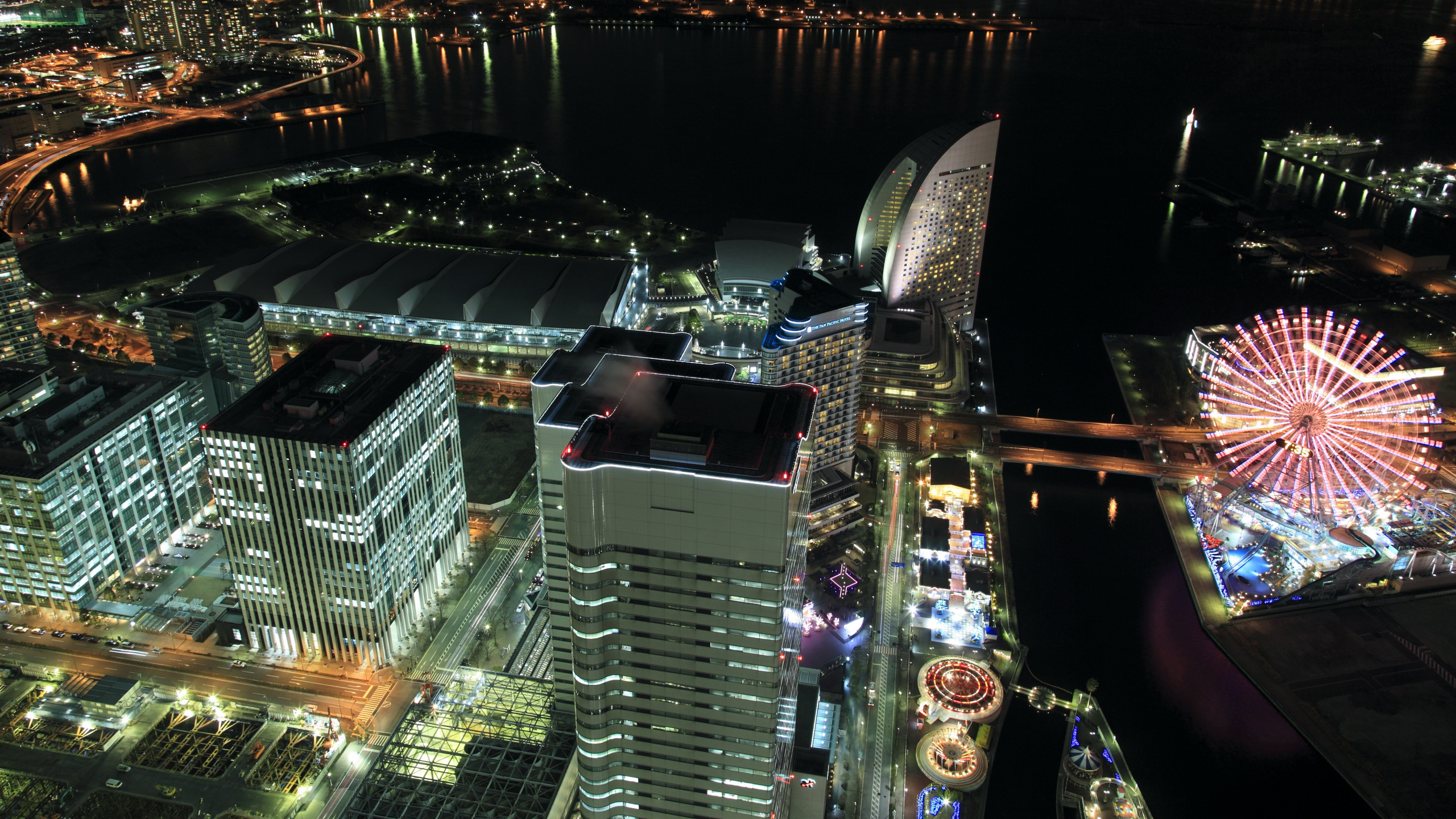 Aerial View of City Buildings During Night Time. Wallpaper in 2560x1440 Resolution